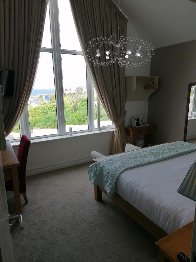 להינץ' Wild Atlantic Lodge Bed & Breakfast מראה חיצוני תמונה